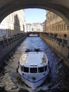 River channel with boat in Saint Petersburg.